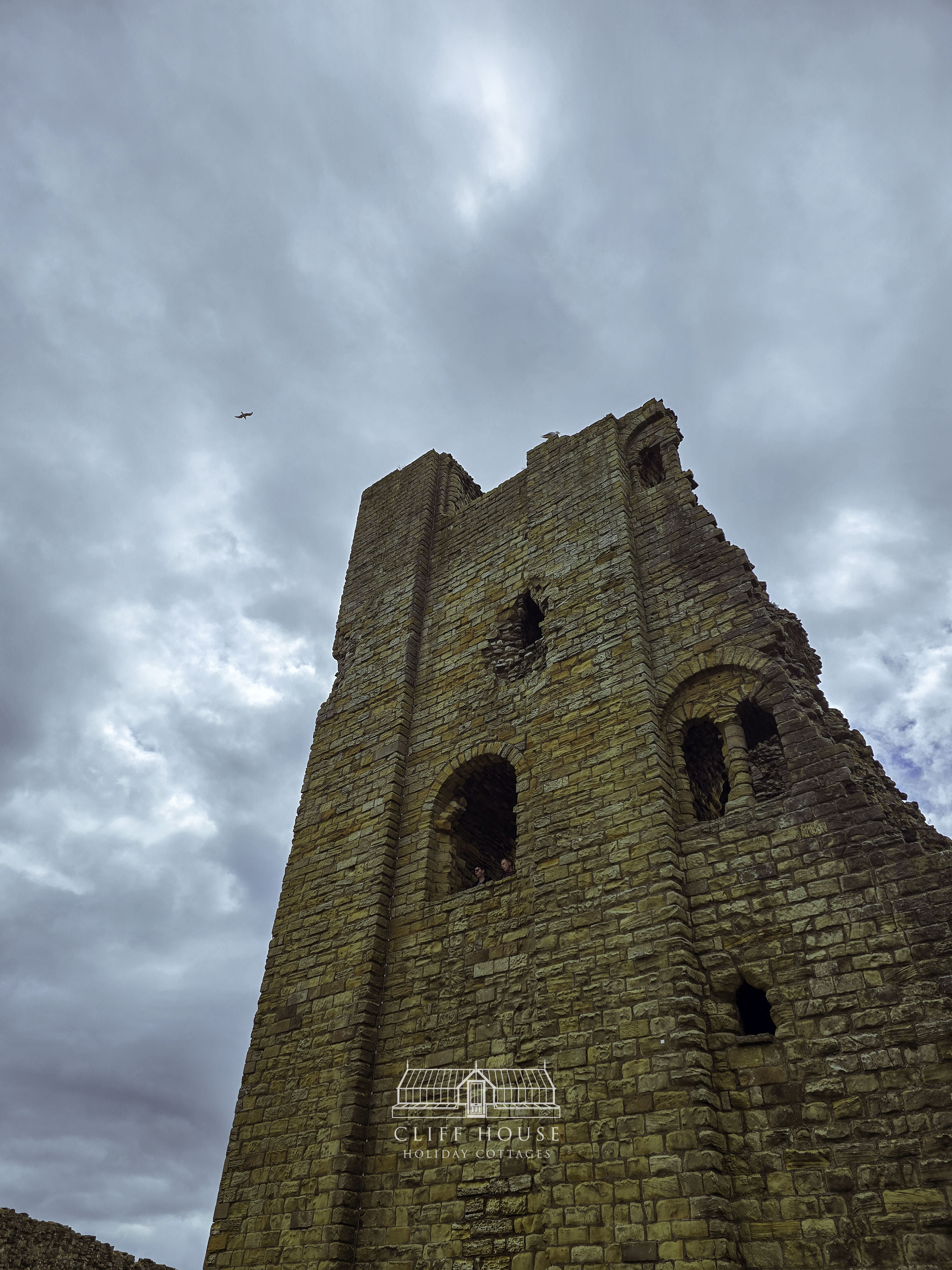 cliff house holiday cottages scarborough castle on the headland above the yorkshire coast with historic stone ruins and views across scarborough visiting scarborough castle